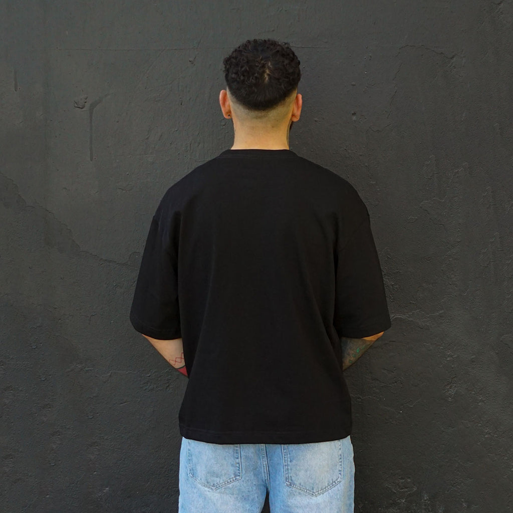 polera boxy fit negra algodon hombre - vista espalda