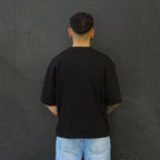 polera boxy fit negra algodon hombre - vista espalda