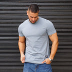 POLERA LONG FIT GRIS PLATA ALGODÓN HOMBRE - VISTA FRONTAL 2