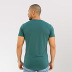 polera long fit verde petróleo algodón hombre - vista espalda